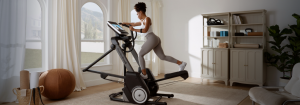 Woman Exercising on One of NordicTrack’s Elliptical Models